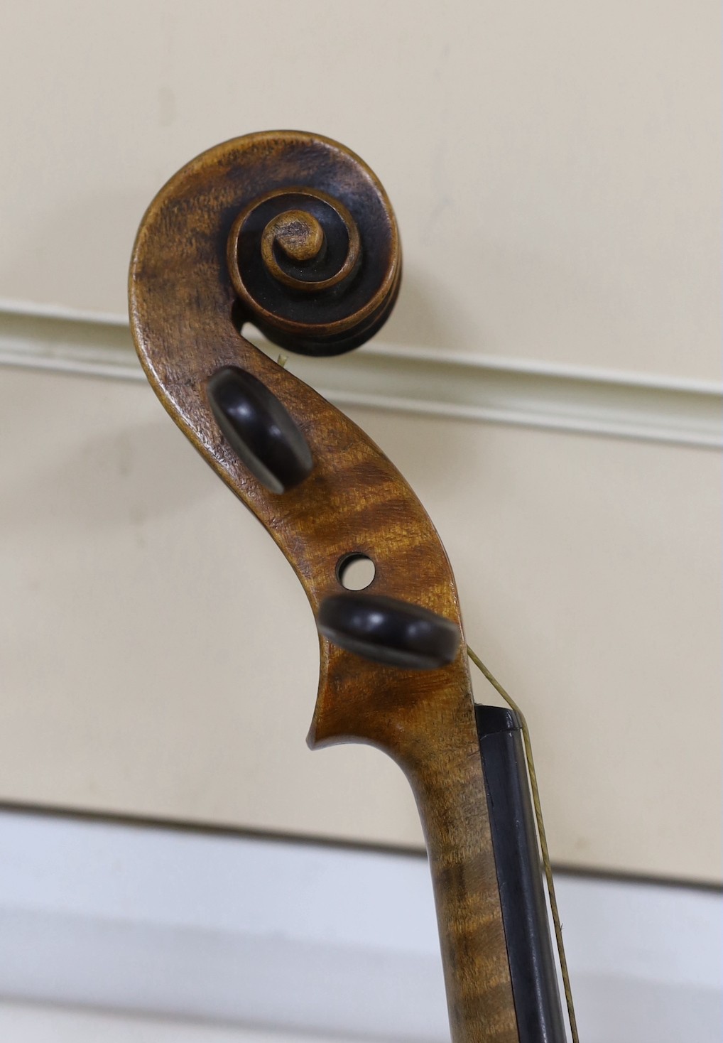 A cased German violin, 60cms long